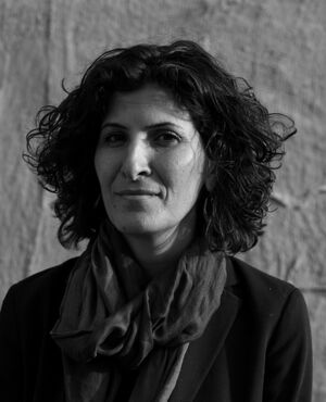 Sandi Hilal. Portrait photo.
