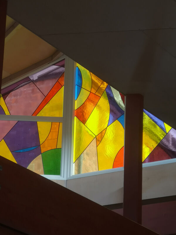 Colored window in church. Photo.