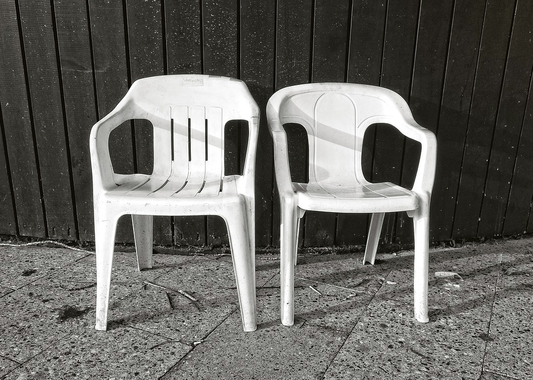 White chair plastic. Photo. 