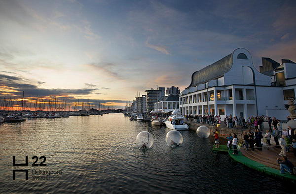 Building along the water. Photo.